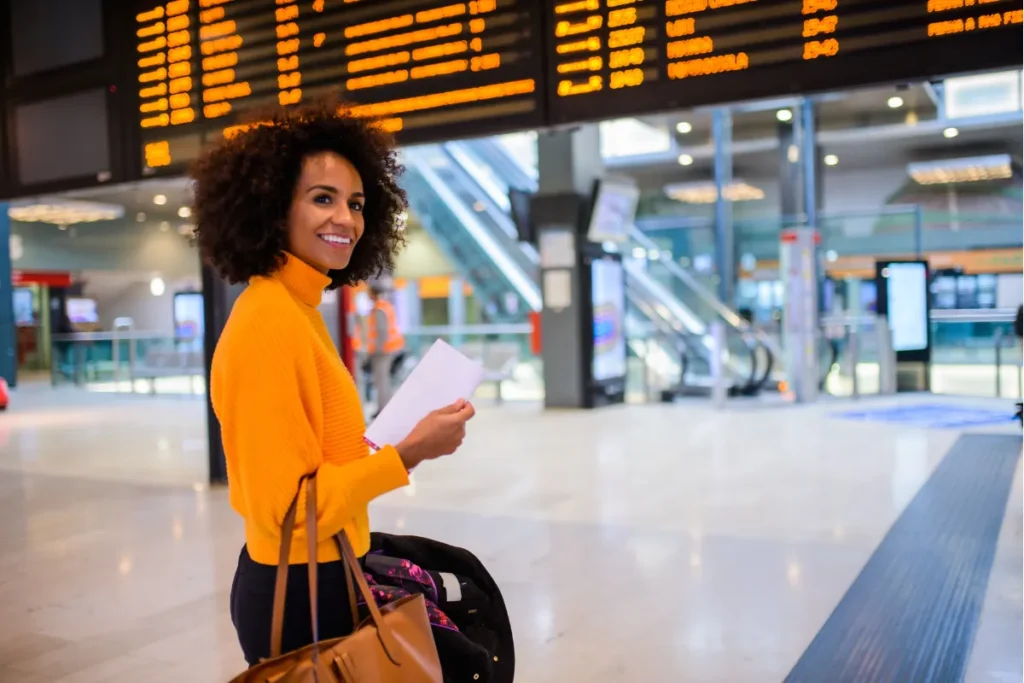 A woman waits at a South African airport